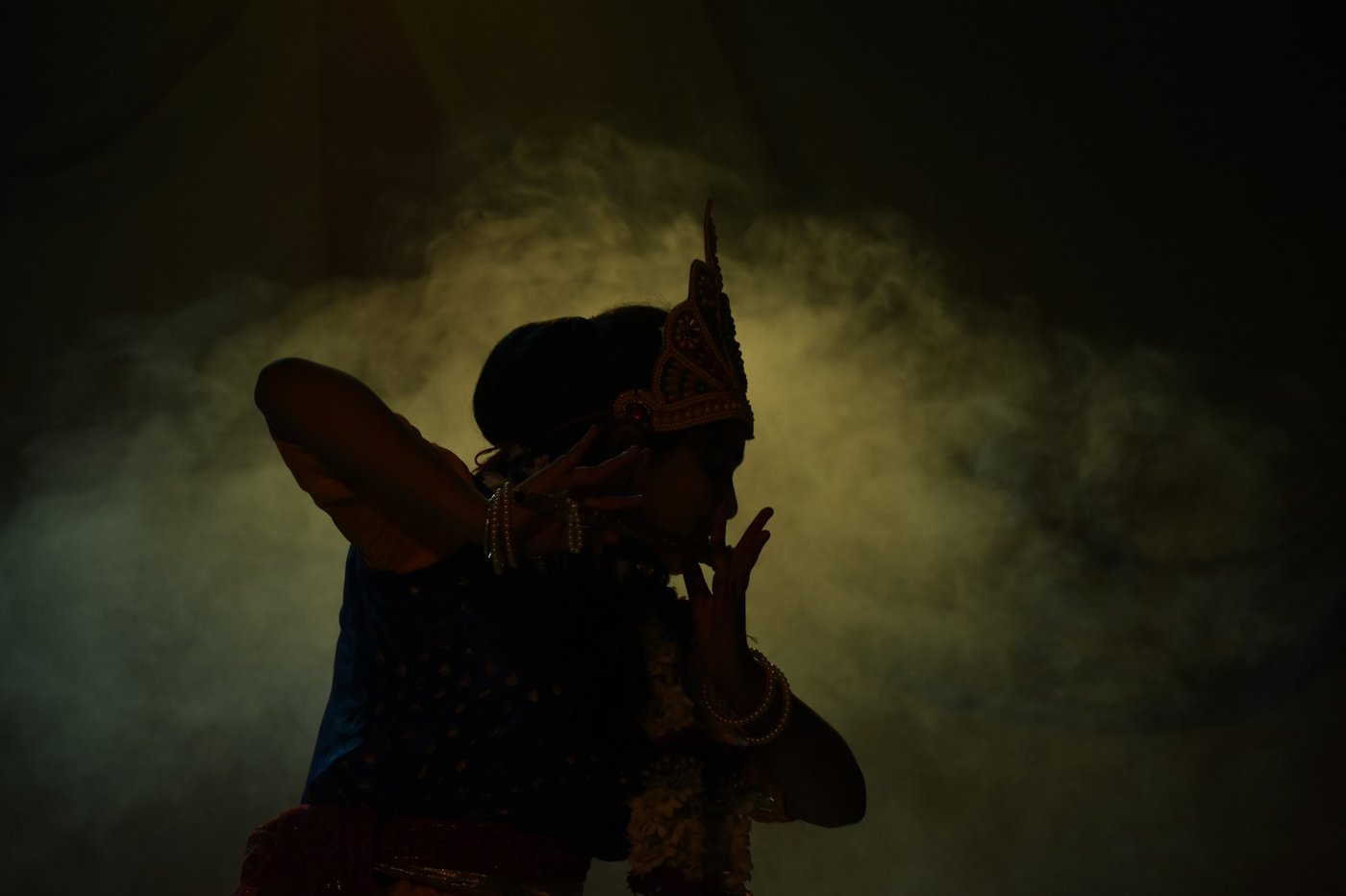Bharatnatyam silhouette stage moment